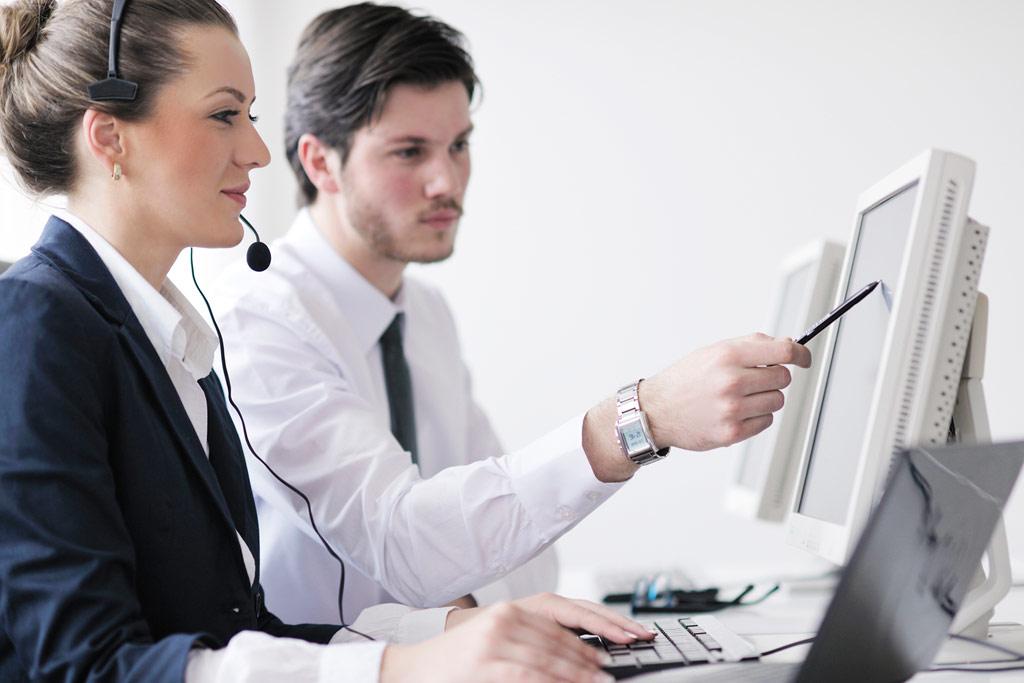business people group with headphones giving support in help desk office to customers, manager giving training and education instructions